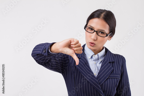 asian business woman showing thumb down