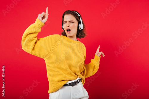 Portrait of a cheerful woman in headphones