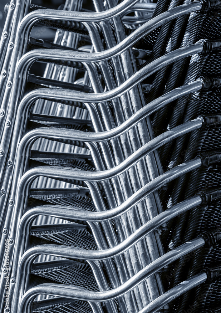 stacked metallic armchairs abstract stacked metallic armchairs abstract