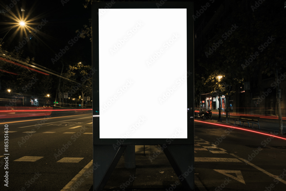 Blank advertisement lightbox by the side of the road at night. Commercial mock-up. Blank advertisement lightbox by the side of the road at night. Commercial mock-up.