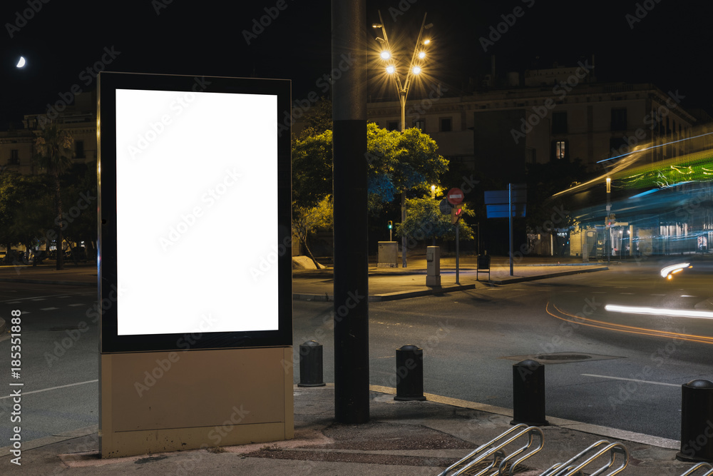 Advertisement mock-up in the street. Lightbox at night. Horizontal ...