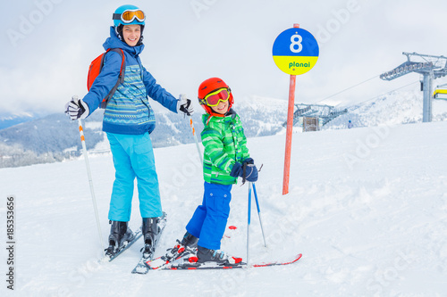 Skiers in a winter ski resort.