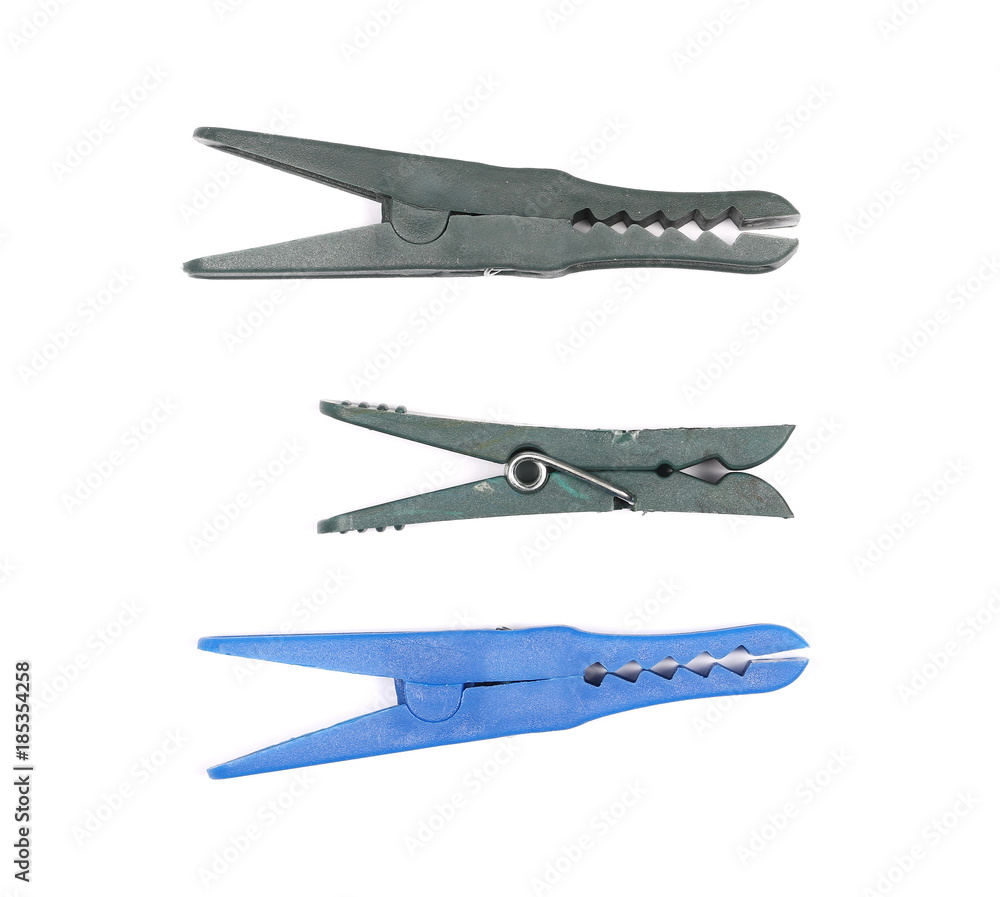 Blue and green clothespins isolated on white background, top view Blue and green clothespins isolated on white background, top view