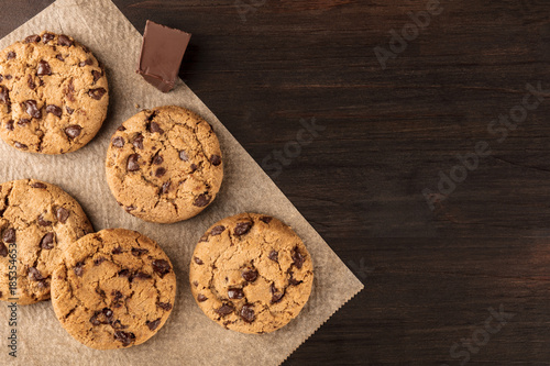 Chocolate chips cookies on baking paper with copyspace