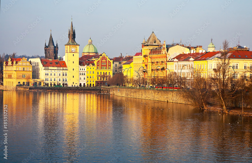 Prague. View from the Vltava River to the museum of the composer B. Smetana. Beautiful cityscape in the sunset light....