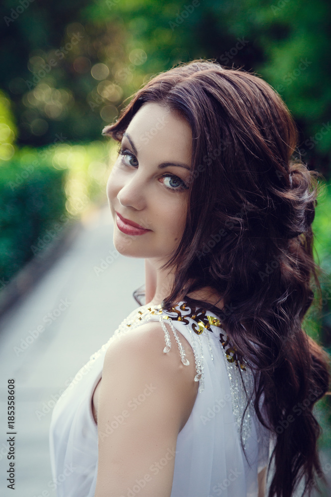 Young sexy girl with long hair and pretty face in white wedding bride dress Young sexy girl with long hair and pretty face in white wedding bride dress
