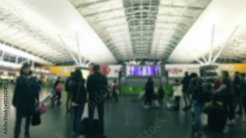 Wallpaper Mural people and airport terminal near the information board, blurry Torontodigital.ca