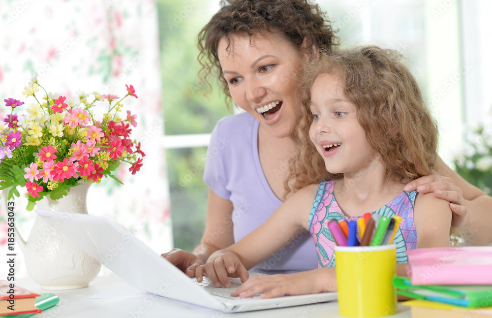 Obraz premium portrait of happy mother and daughter 