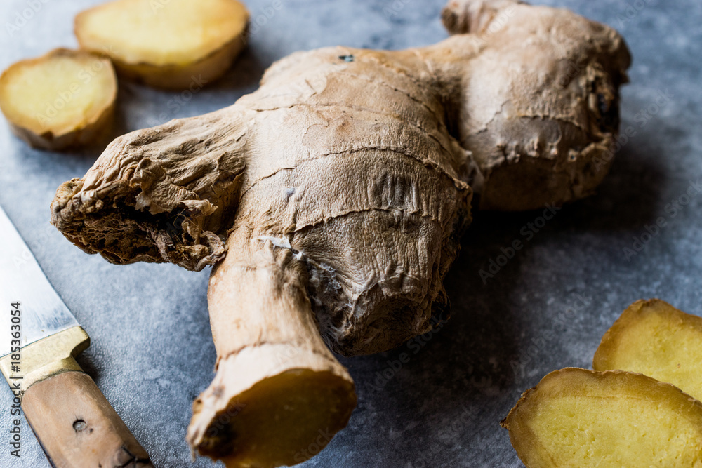 Fototapeta premium Raw Organic Sliced Ginger Root Ready to Use.