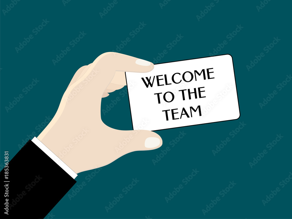A man's hand (businessman) holds a card with words A man's hand (businessman) holds a card with words