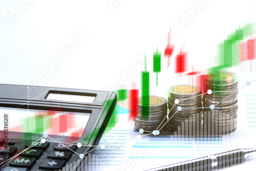 Double exposure of business Calculator and Coins of thailand with stock market or financial graph for financial investment and trading concept