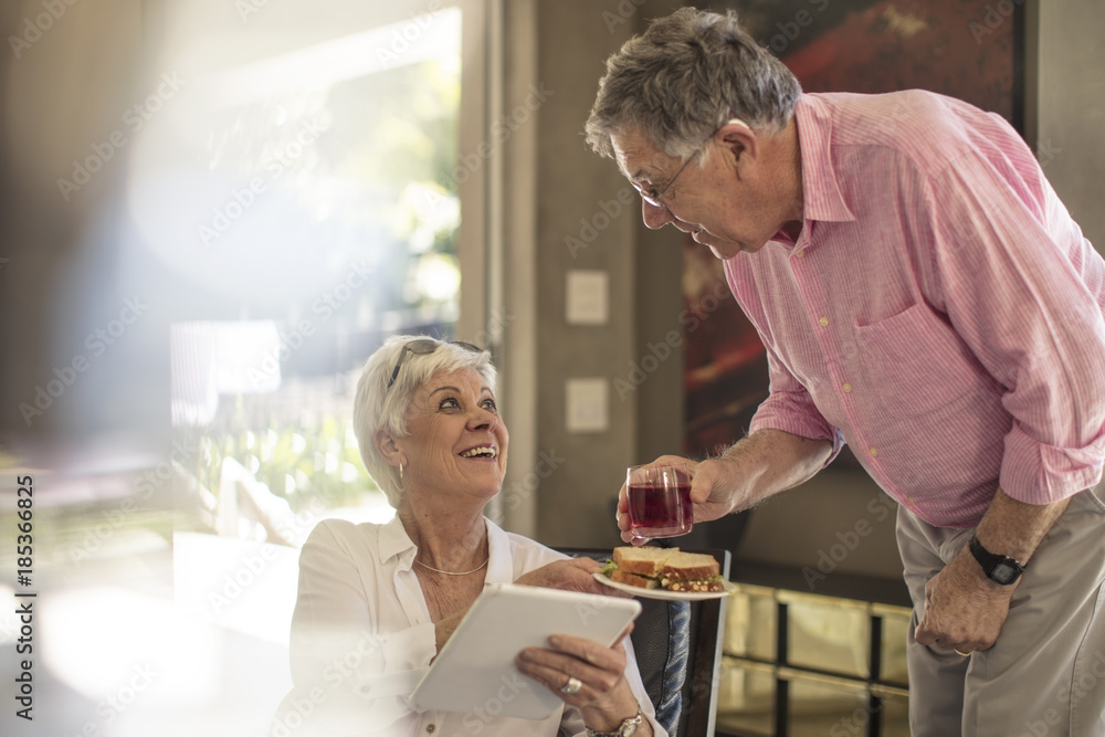 Happy senior couple together at home Happy senior couple together at home