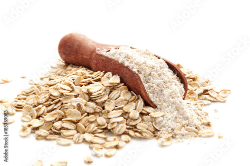 Photography Pile of oat wholegrain flour in spoon