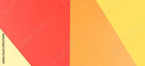 Abstract geometric paper background. Yellow, orange, red colors.