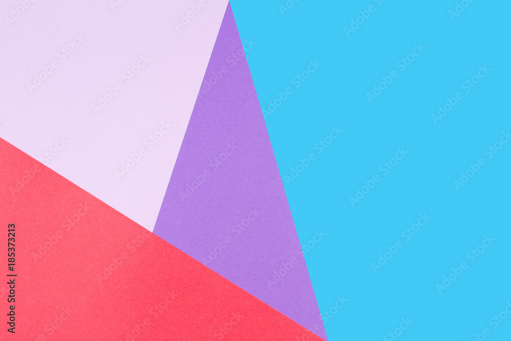 Abstract geometric colored paper background. Blue, red, pink and purple colors