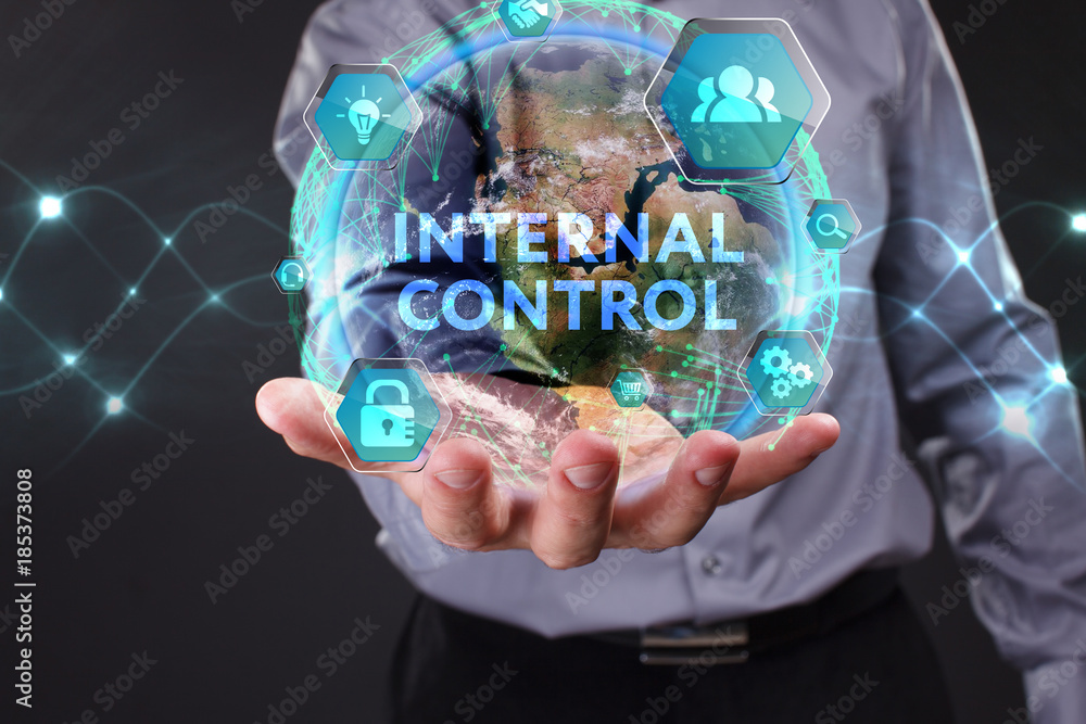 The concept of business, technology, the Internet and the network. A young entrepreneur working on a virtual screen of the future and sees the inscription: Internal control The concept of business, technology, the Internet and the network. A young entrepreneur working on a virtual screen of the future and sees the inscription: Internal control