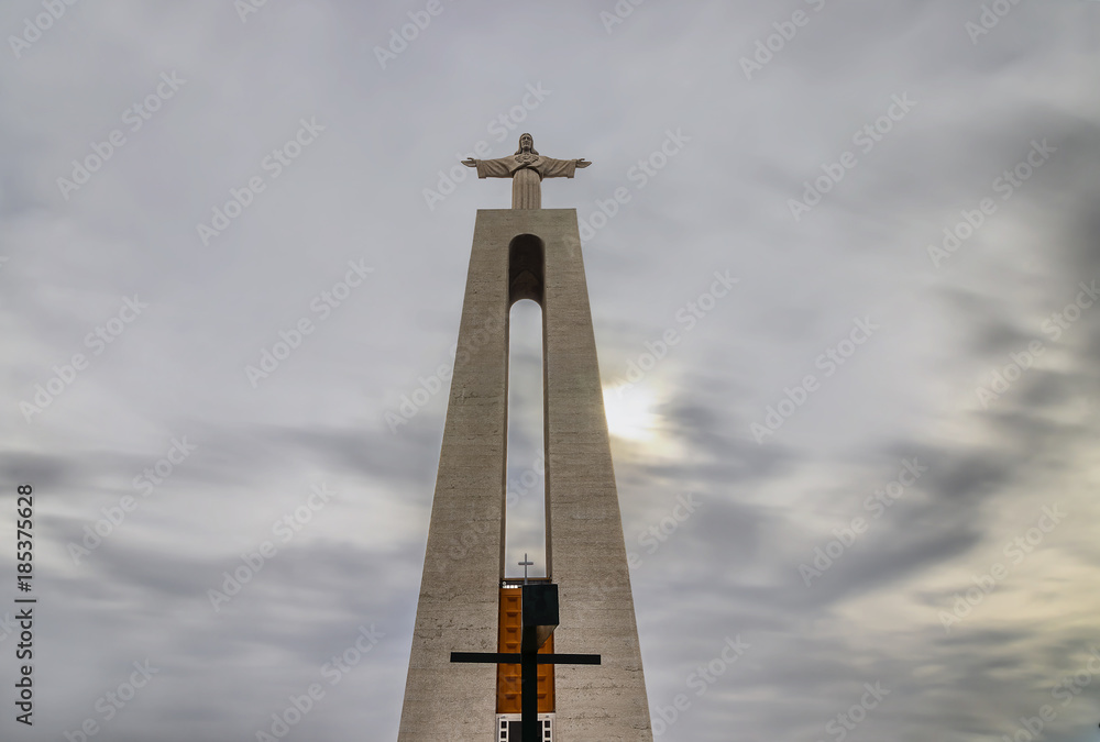 Long exposure Photography of  Sanctuary of Christ the King in a cloudy day, overlooking the Lisbon in a cloudy day