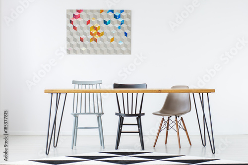 Dining room with geometric painting