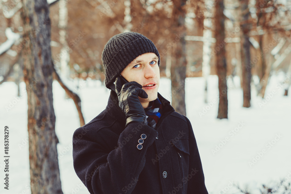the man on the phone in the winter the man on the phone in the winter
