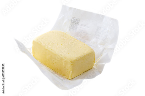 Close up of open pack of margarine or vegetarian butter on white backgraund.