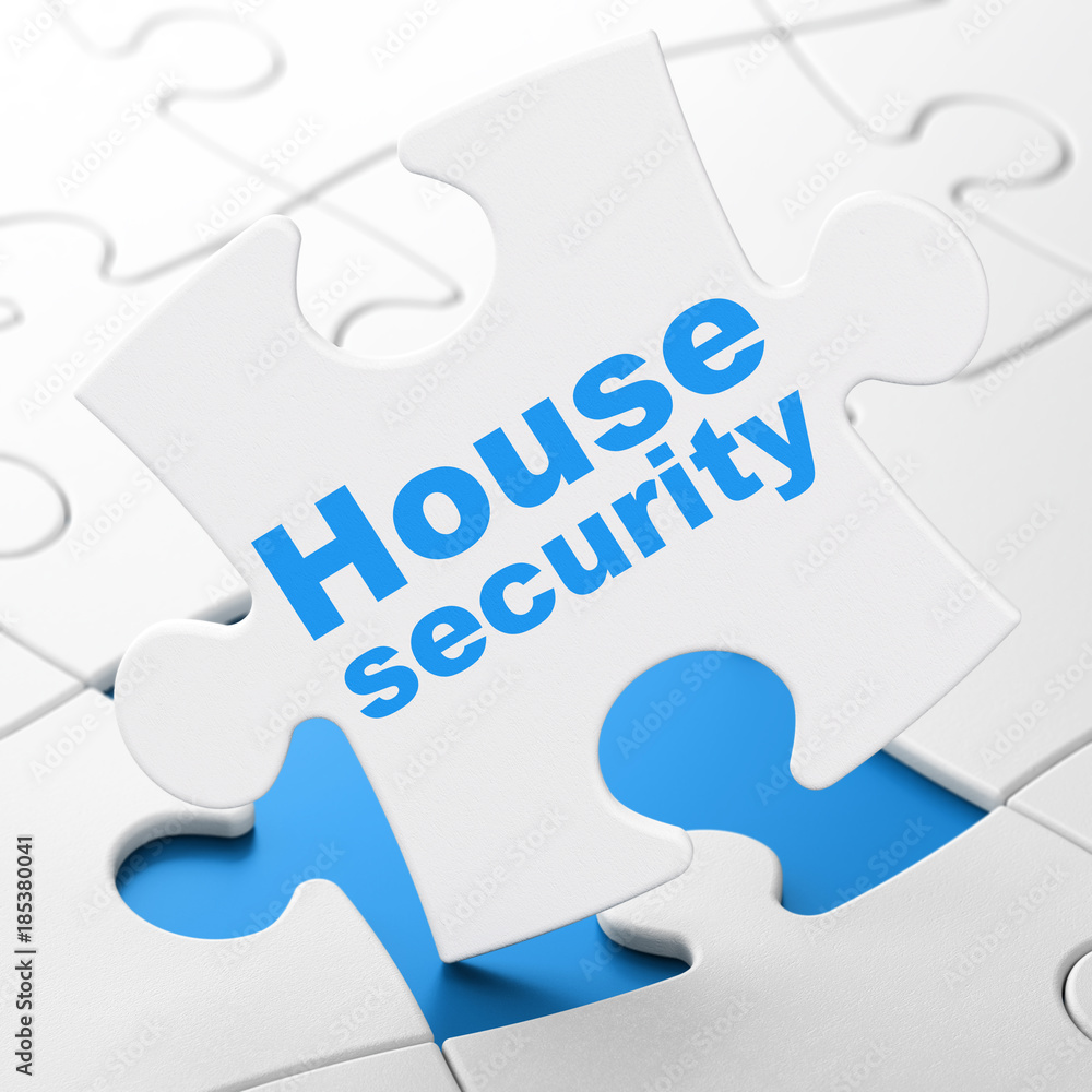 Safety concept: House Security on puzzle background Safety concept: House Security on puzzle background