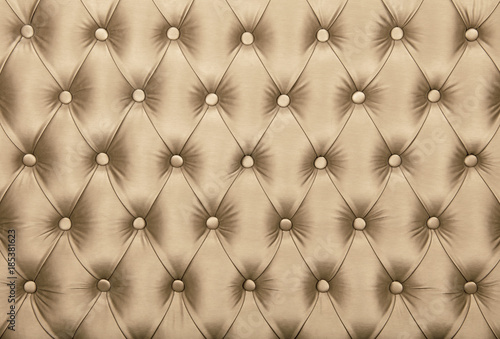 Beige capitone tufted fabric upholstery texture