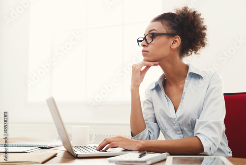 Business woman working on laptop at office