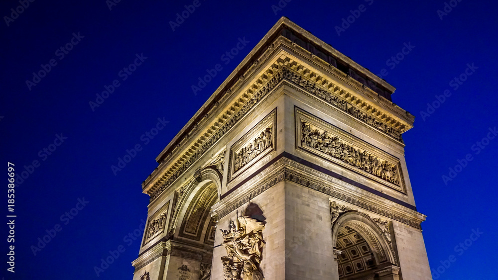 Arc de Triomphe at twilight in Paris, France