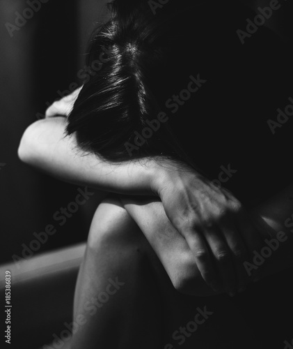 Young woman in depression, black and white.