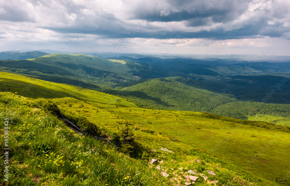 grassy slopes of Carpathians before the storm. beautiful mountainous landscape in summertime