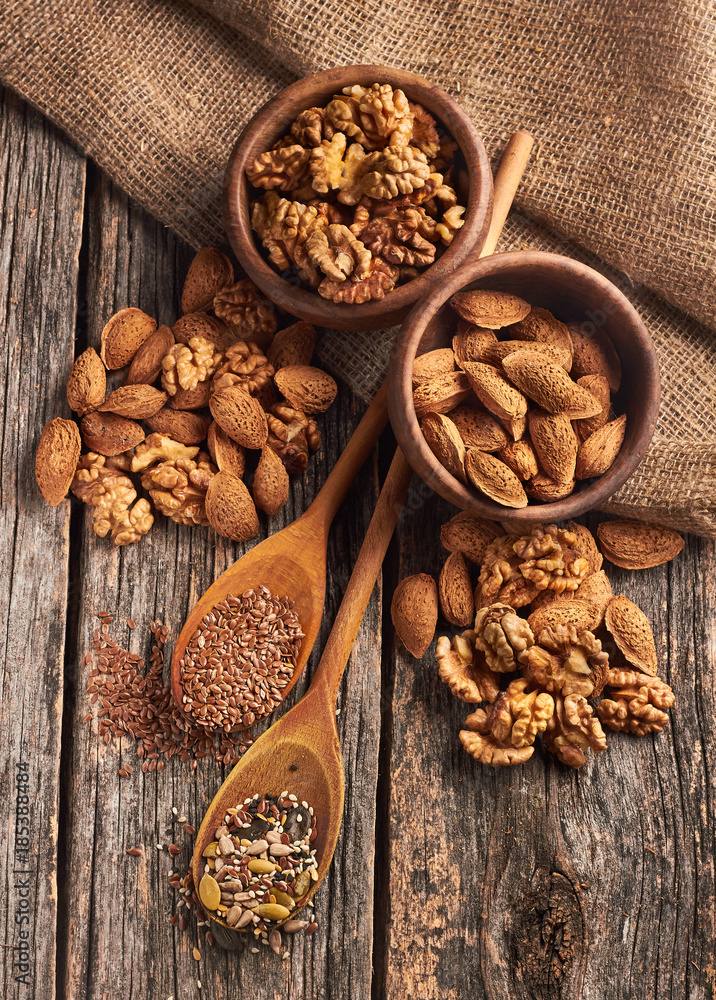 Food ingredients in wooden spoon on wooden background. Food ingredients in wooden spoon on wooden background.