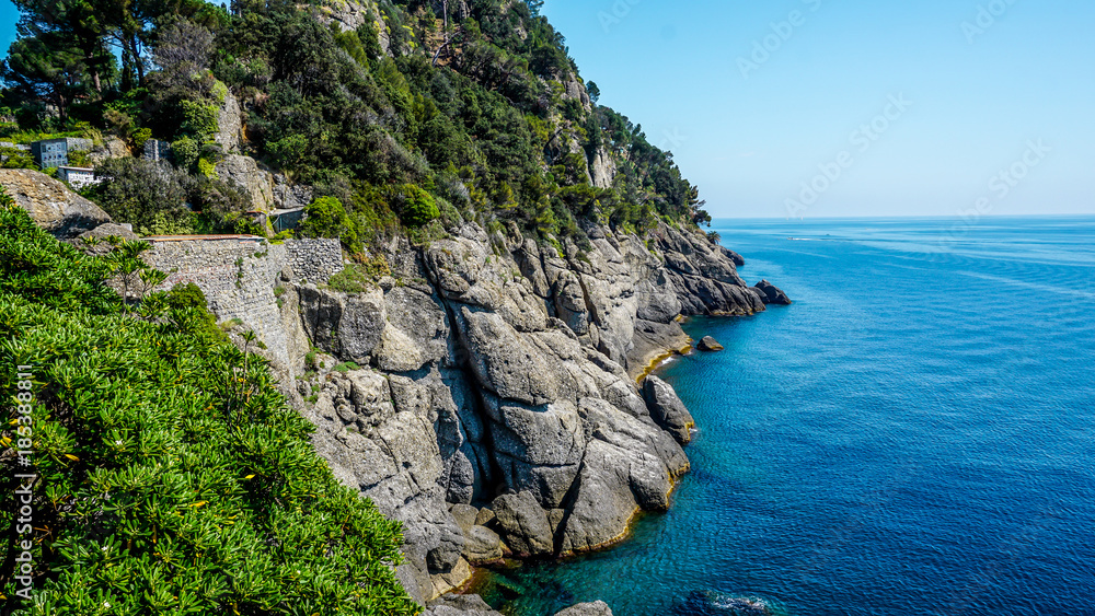 Fototapeta premium Vibrant blue ocean around Portofino, Italy