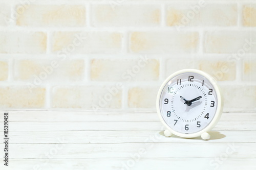 Wallpaper Mural Selective focus of table clock isolated with copy space for text.Table clock showing time ten past ten. Torontodigital.ca