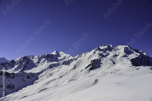 Snow capped mountain peaks, enroute Sarpass trek in Himachal Pradesh, India