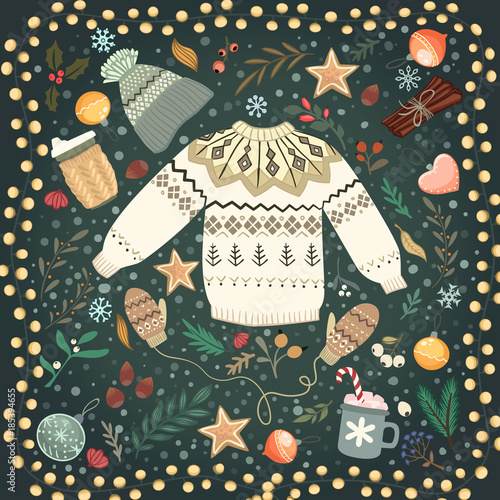 Stack of cozy knitted sweaters and lantern on a table
