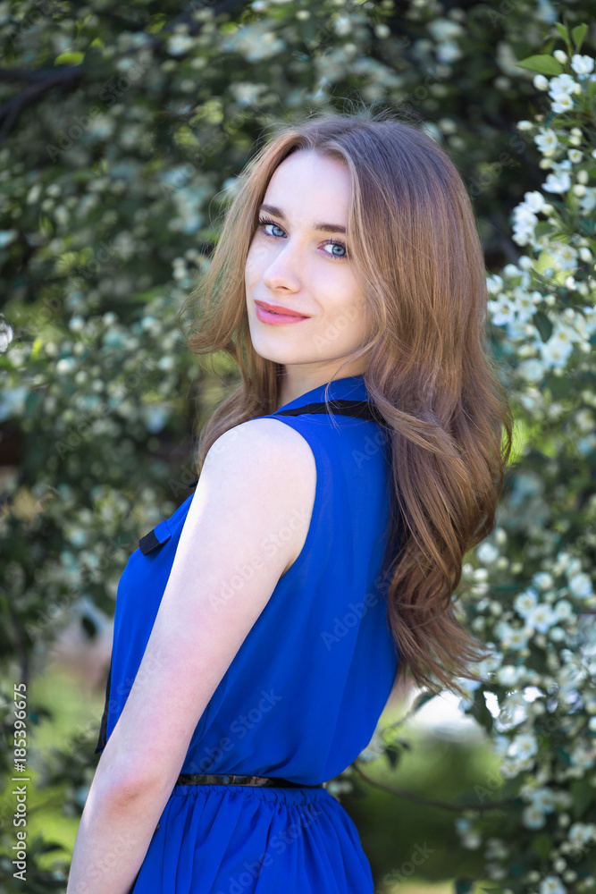 Girl spring apple tree