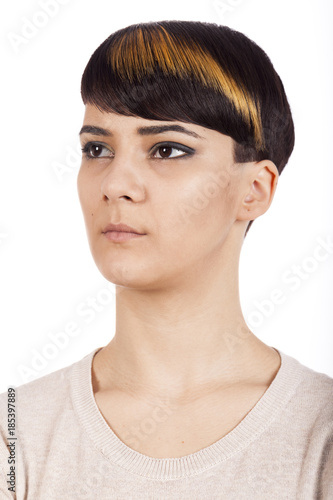 Young woman wearing pixie short highlighted hairstyle