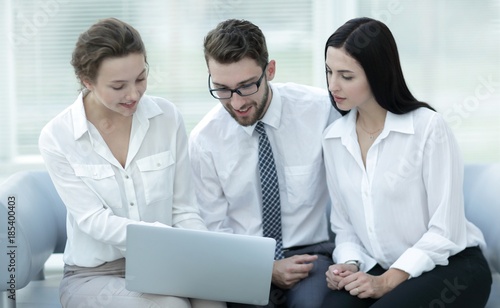 Wallpaper Mural business team looks at the information on the laptop Torontodigital.ca