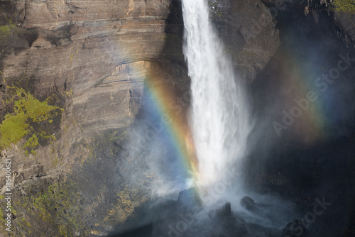 Fragment of Haifoss waterfall with rainbow