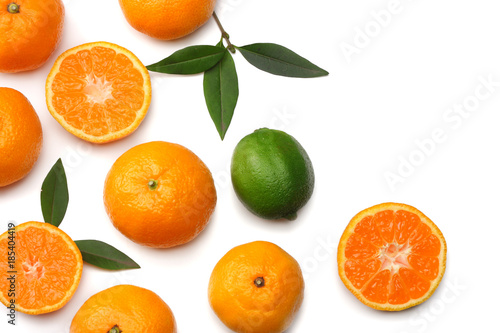 mandarin with slices and green leaf isolated on white background top view