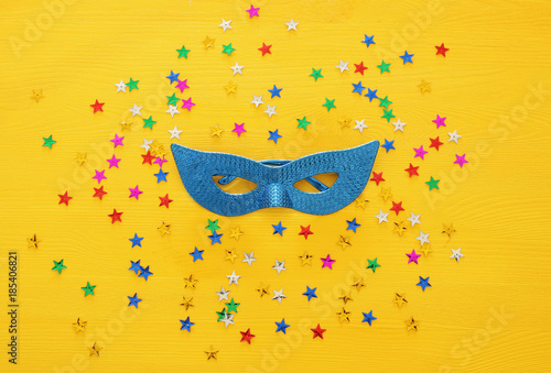 Top view image of masquerade venetian mask background. Flat lay. Purim celebration concept (jewish carnival holiday).