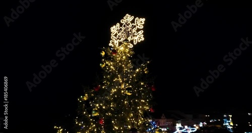Amazing close up aerial view of Night fairytale Christmas Tree, Uzhgorod, Ukraine, 4k