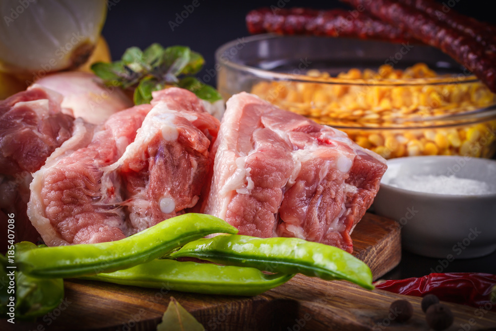 products for preparation of pea soup with smoked products: peeled peas, onions, pork, salt, spices
