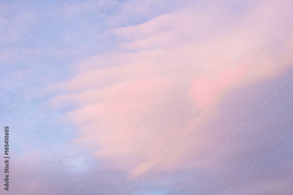Blue sky with pink clouds