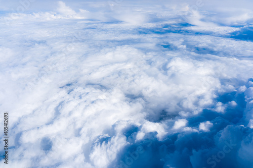 Fototapeta Naklejka Na Ścianę i Meble -  Fluffy White Clouds from Above. clouds and sky