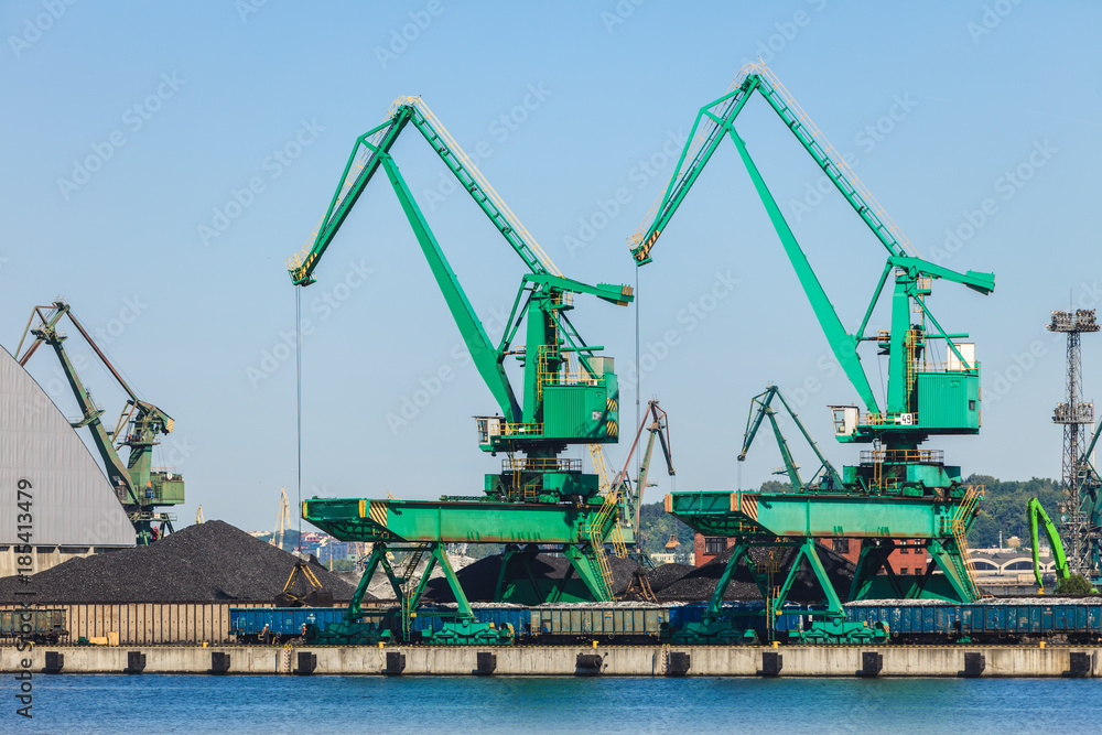 Cranes in morning harbour. Cranes in morning harbour.