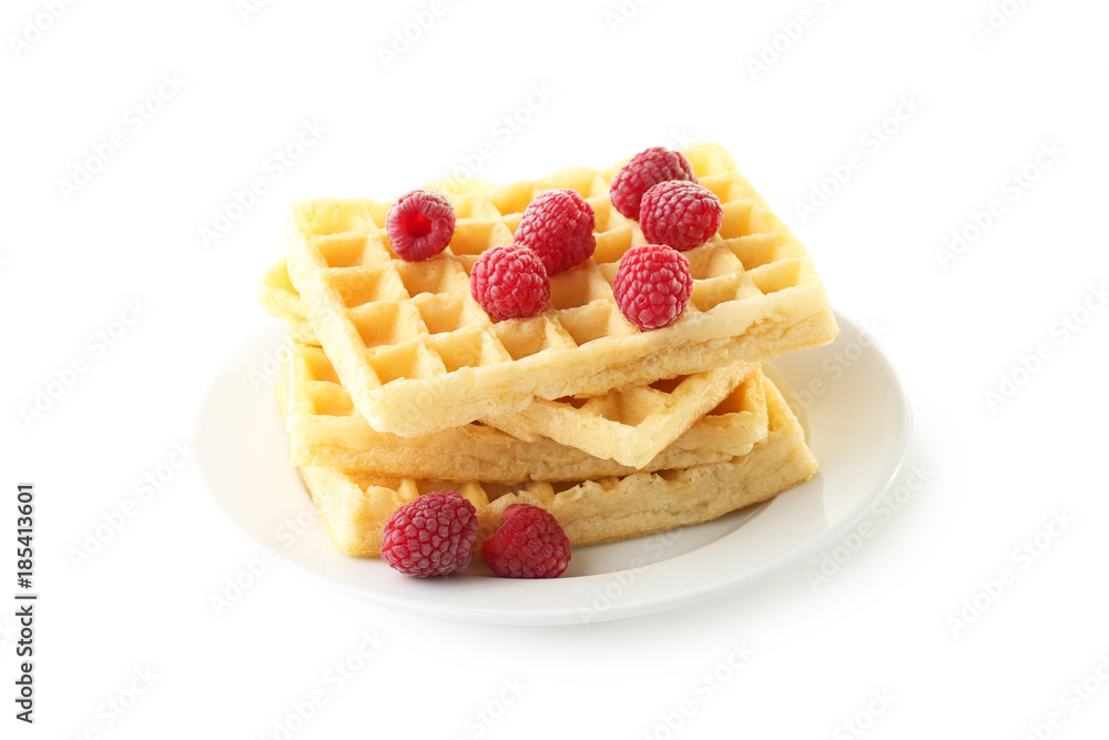Sweet waffle with raspberries isolated on a white Sweet waffle with raspberries isolated on a white