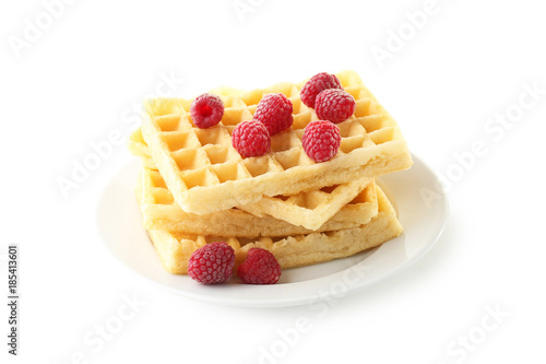 Sweet waffle with raspberries isolated on a white