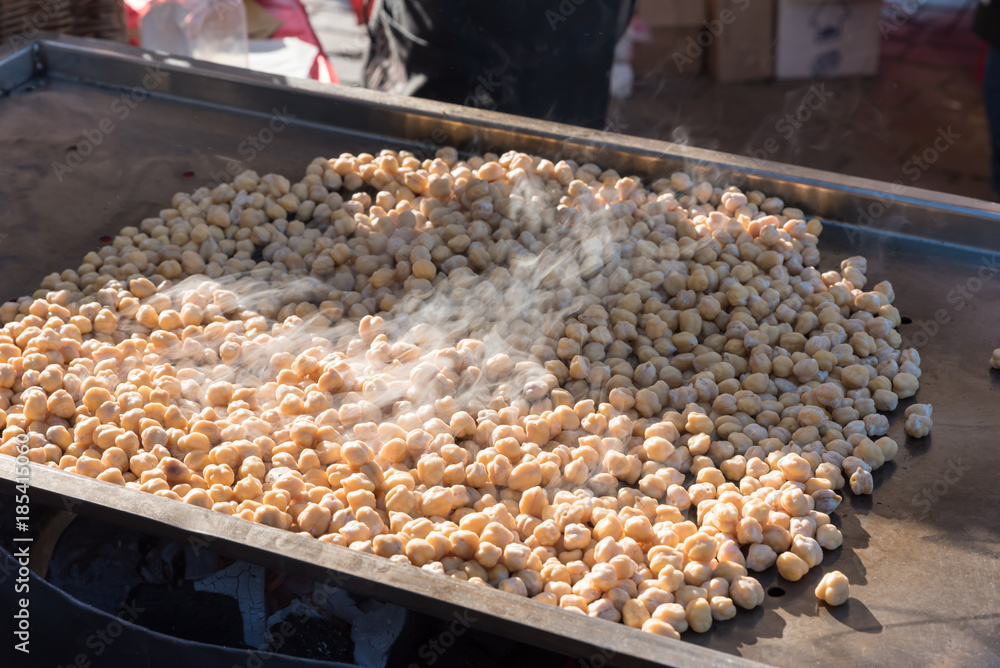 Hot grilled chickpeas. Street food Hot grilled chickpeas. Street food