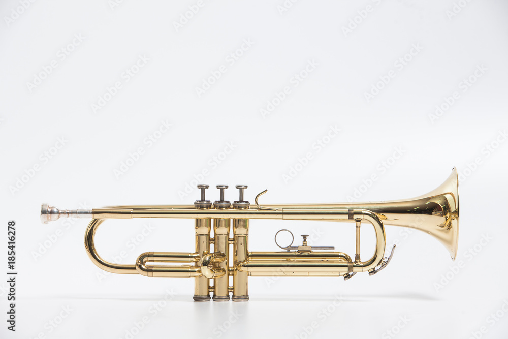 Gold lacquer trumpet with mouthpiece isolated on white Gold lacquer trumpet with mouthpiece isolated on white